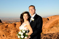 Bride and groom posing at Valley of Fire - Amanda Miles Photography